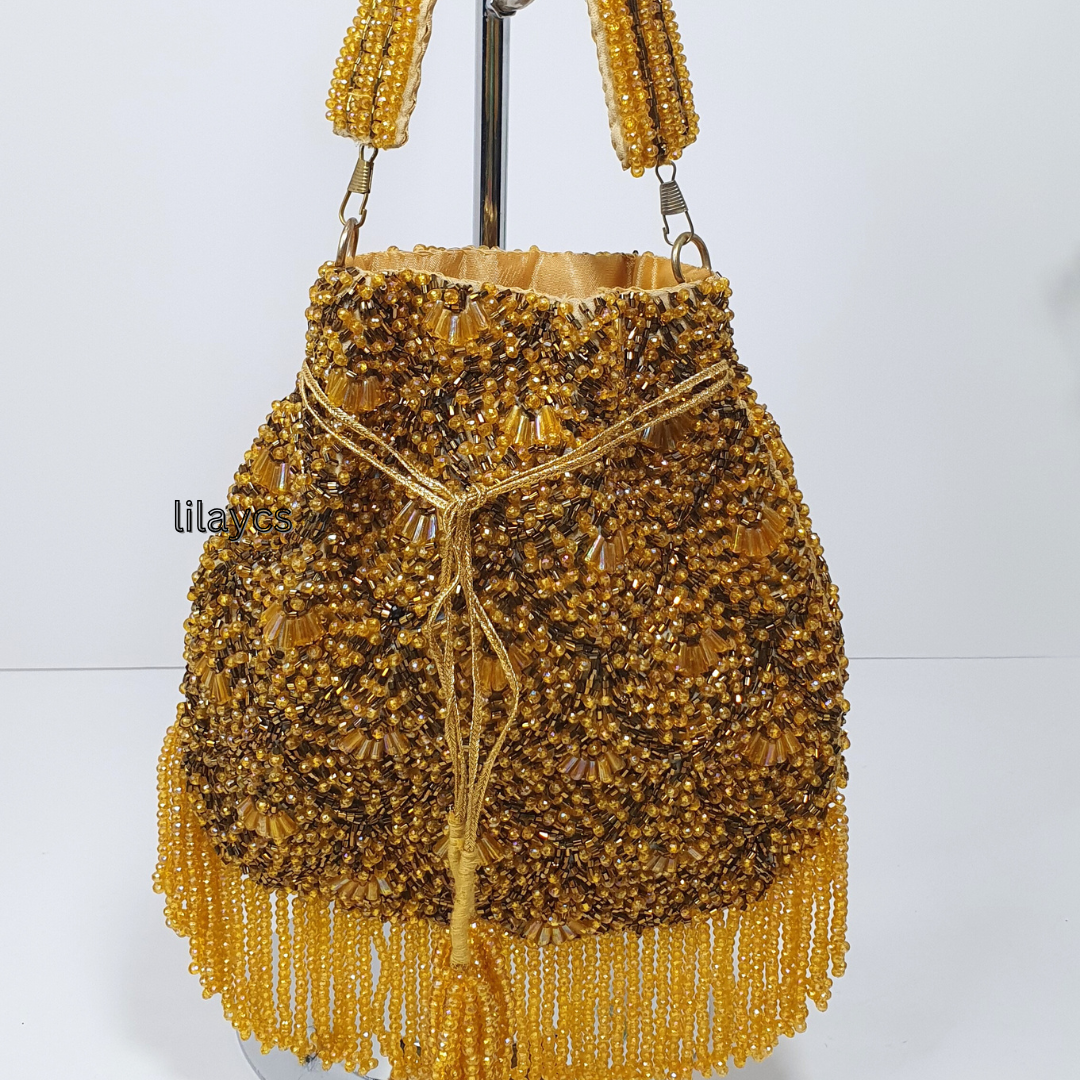 Handmade Glamourous Pearl Embellished Potli Bag: Perfect Accessory for the Festive Season